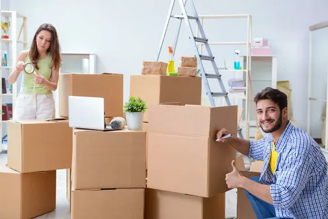 Professional residential pack and moves team loading household furniture into a moving truck in New Zealand