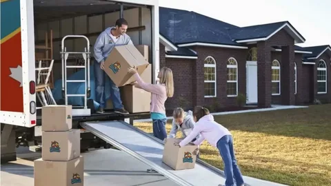 Reliable residential movers carefully loading household furniture into a moving truck for a safe and stress-free home relocation.