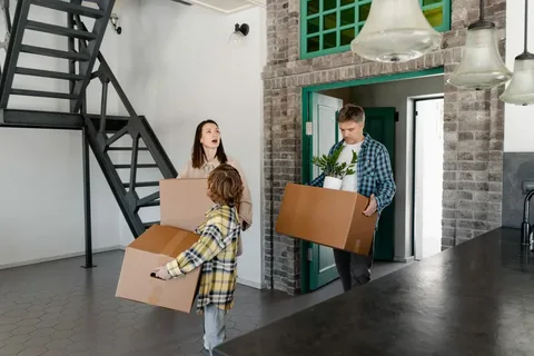 Professional residential moving home service loading household furniture and boxes for a safe and stress-free relocation