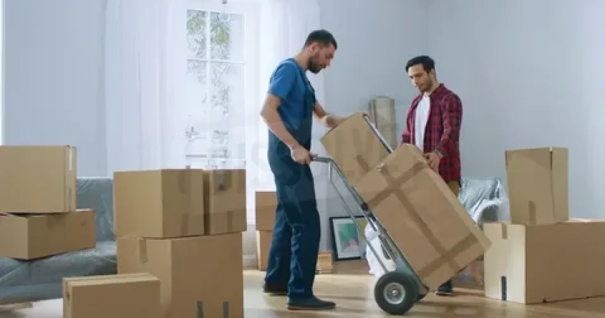 Family packing boxes with BetterMoves movers for a smooth and stress-free home relocation